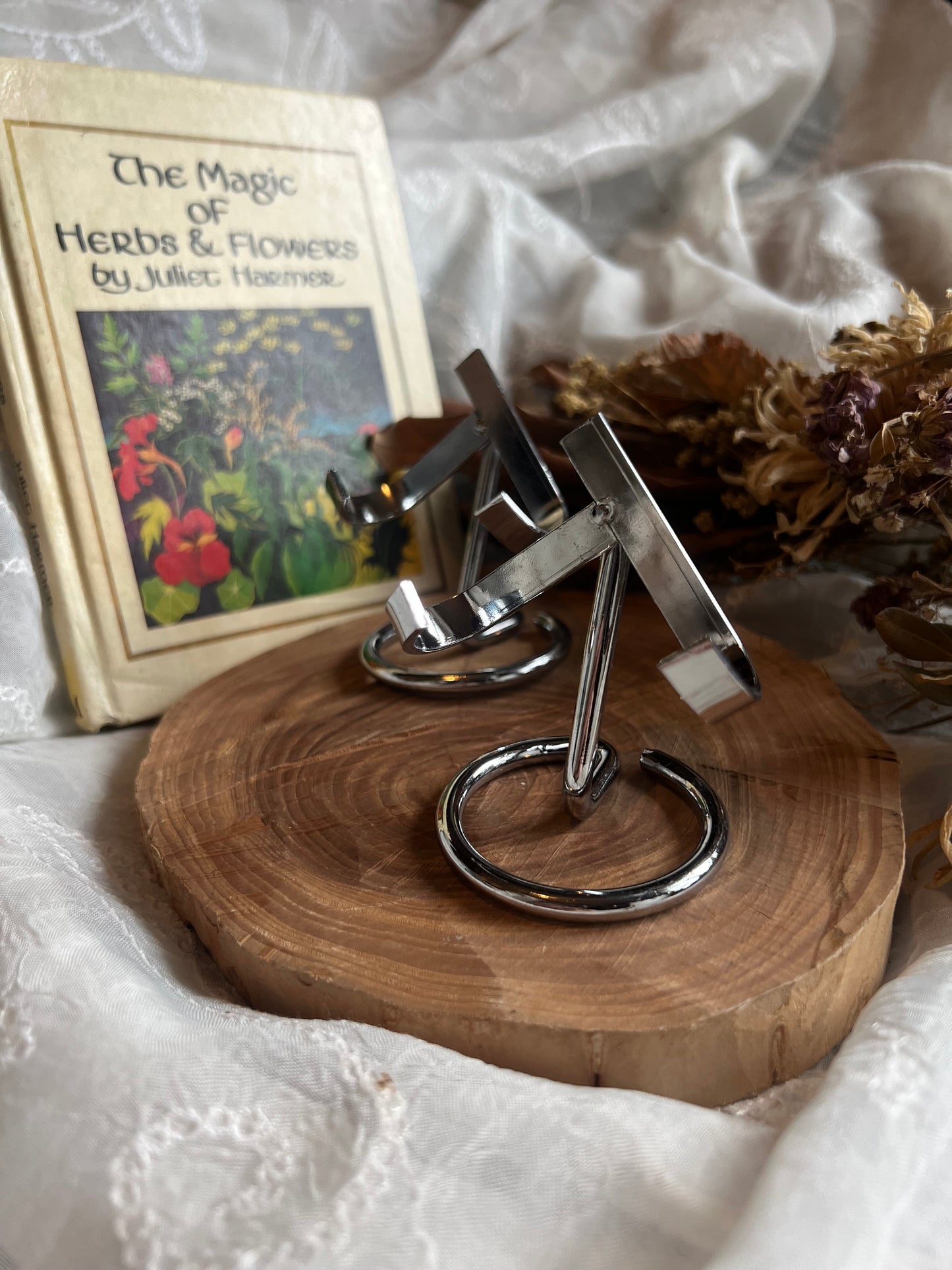 silver metal crystal stand