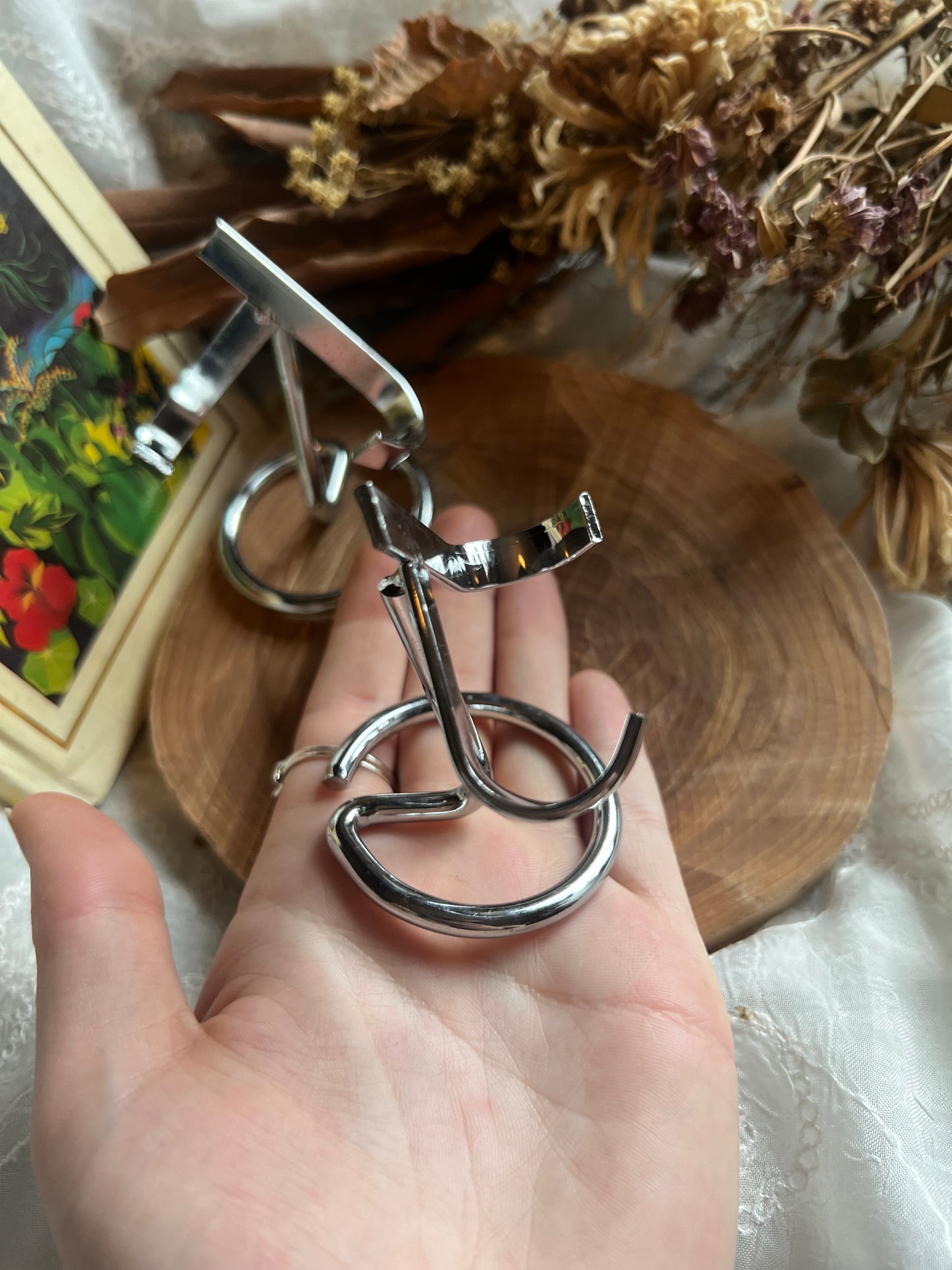 silver metal crystal stand