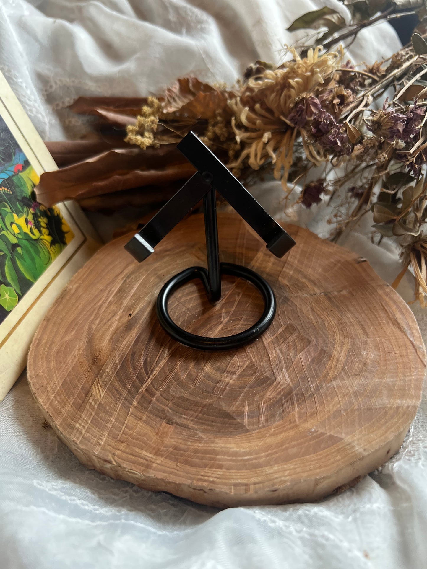 black metal crystal stand