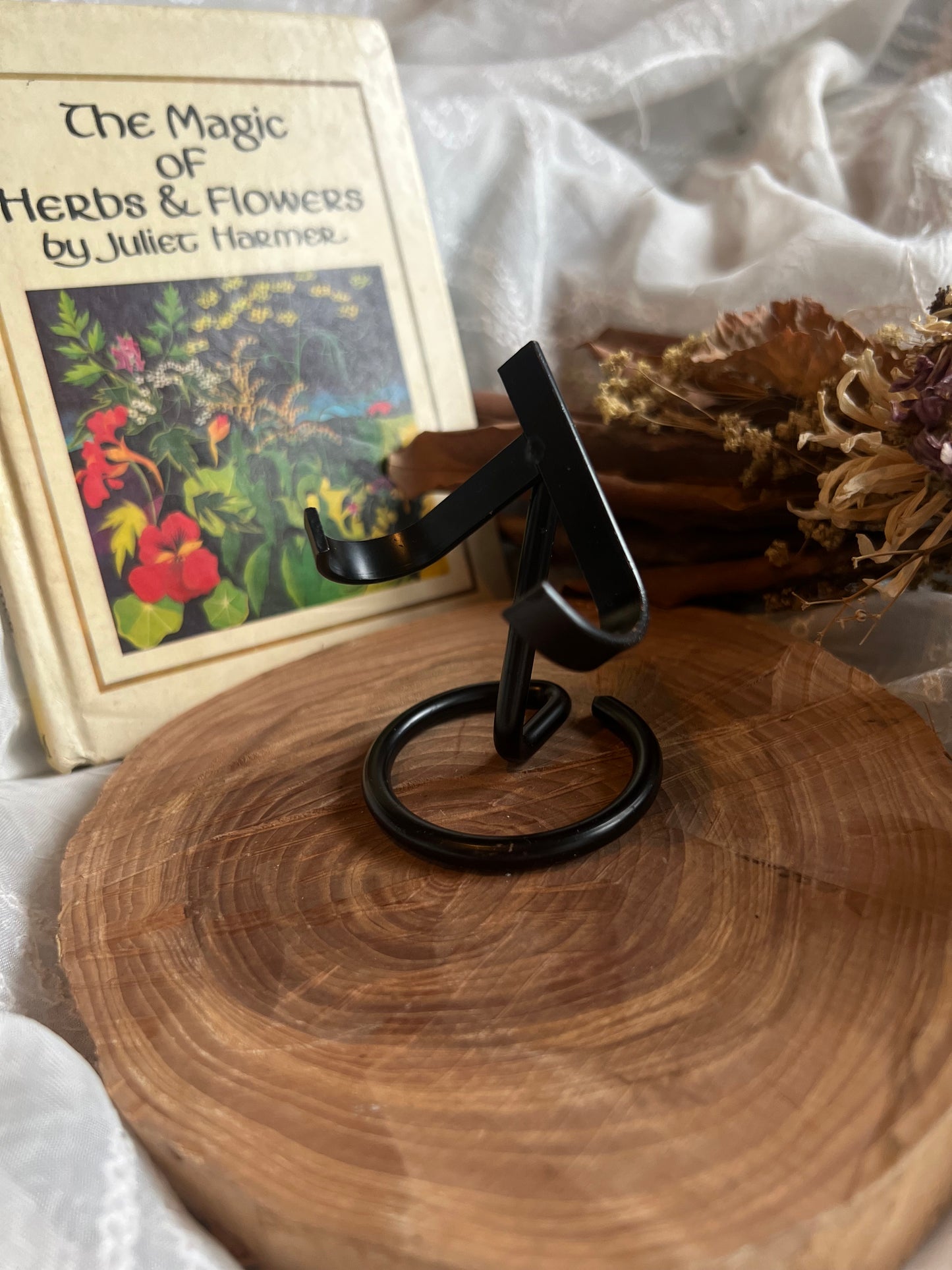 black metal crystal stand