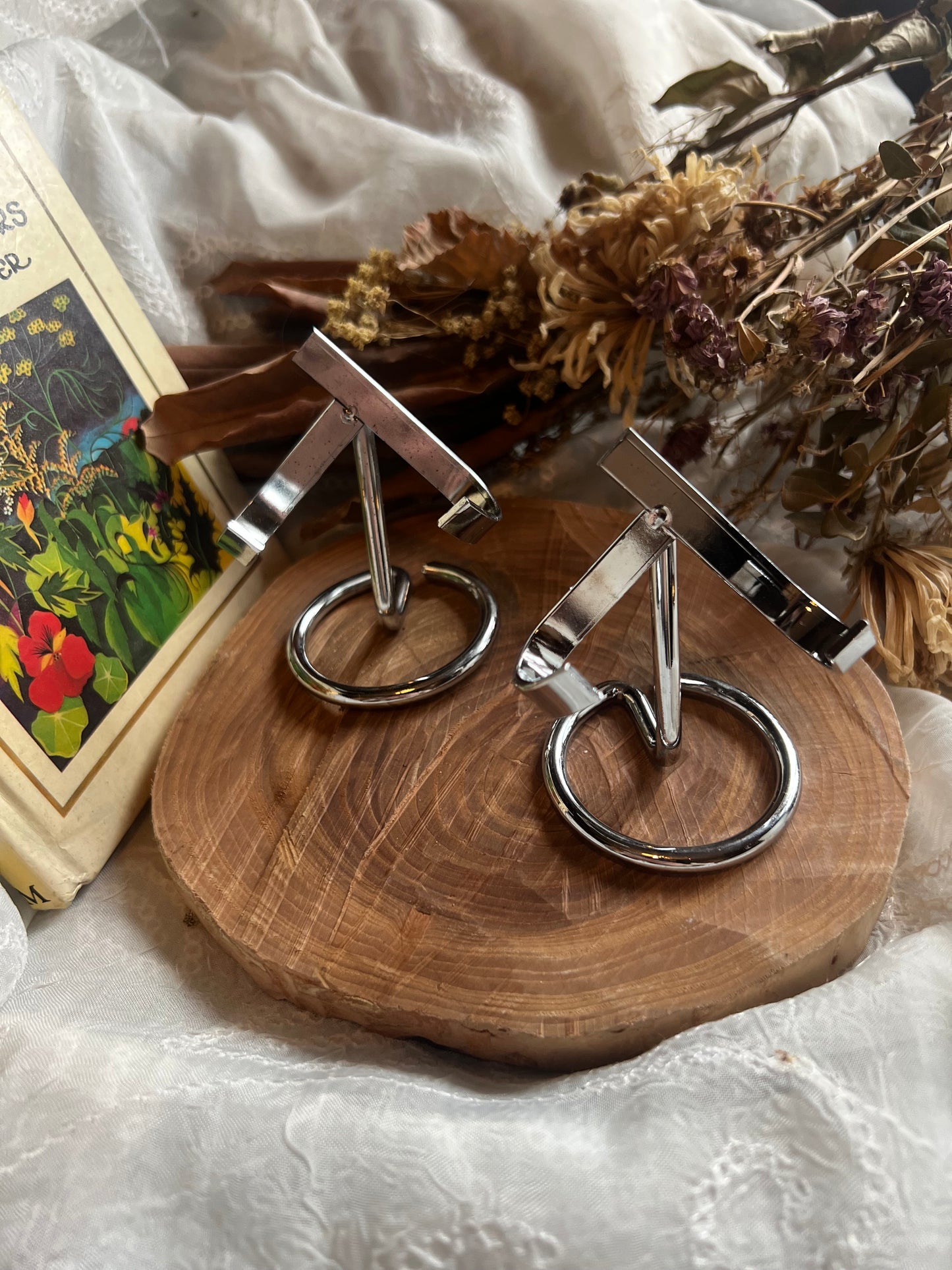 silver metal crystal stand