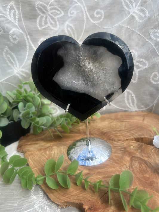large black agate heart carving with stand
