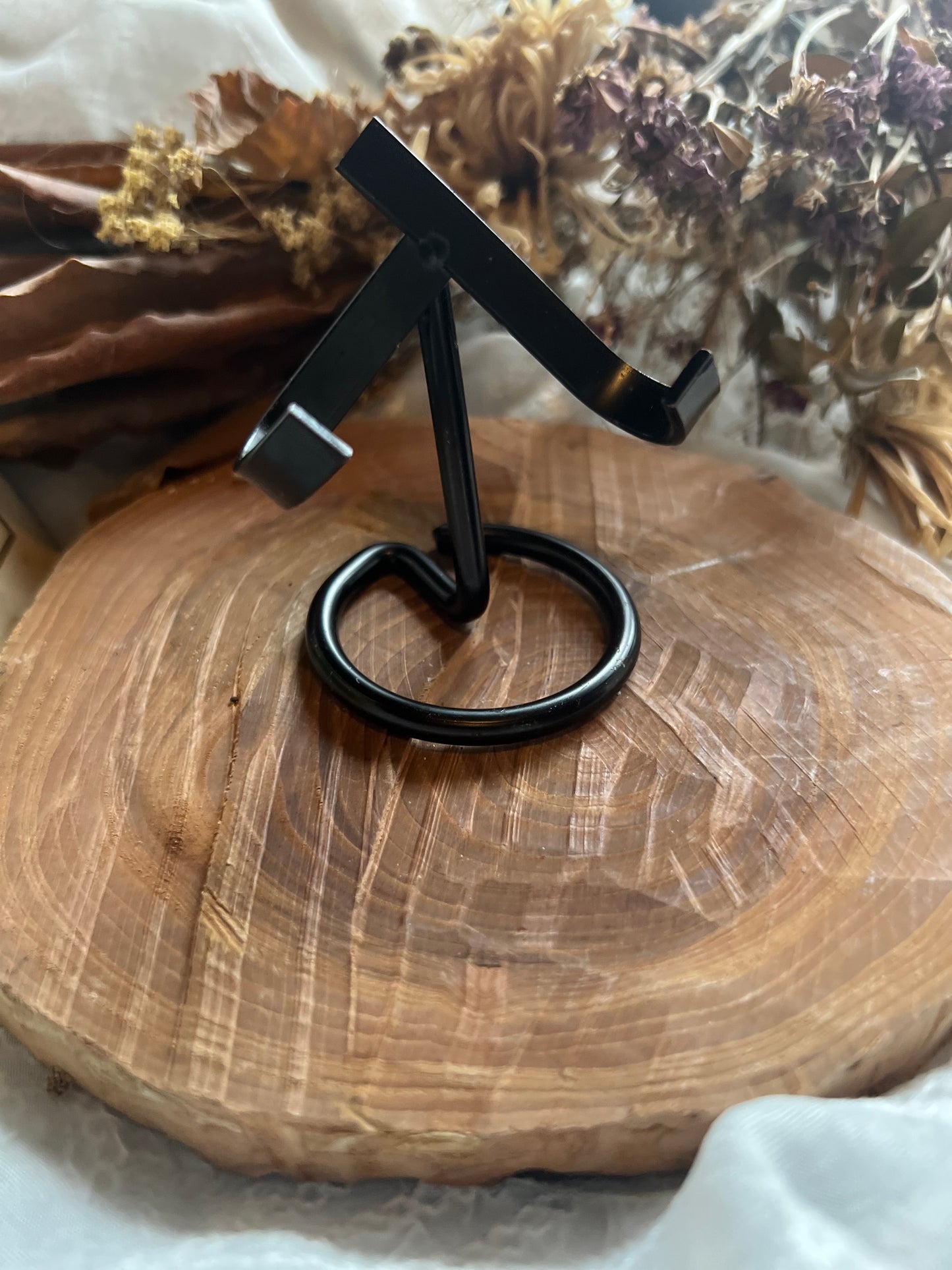 black metal crystal stand
