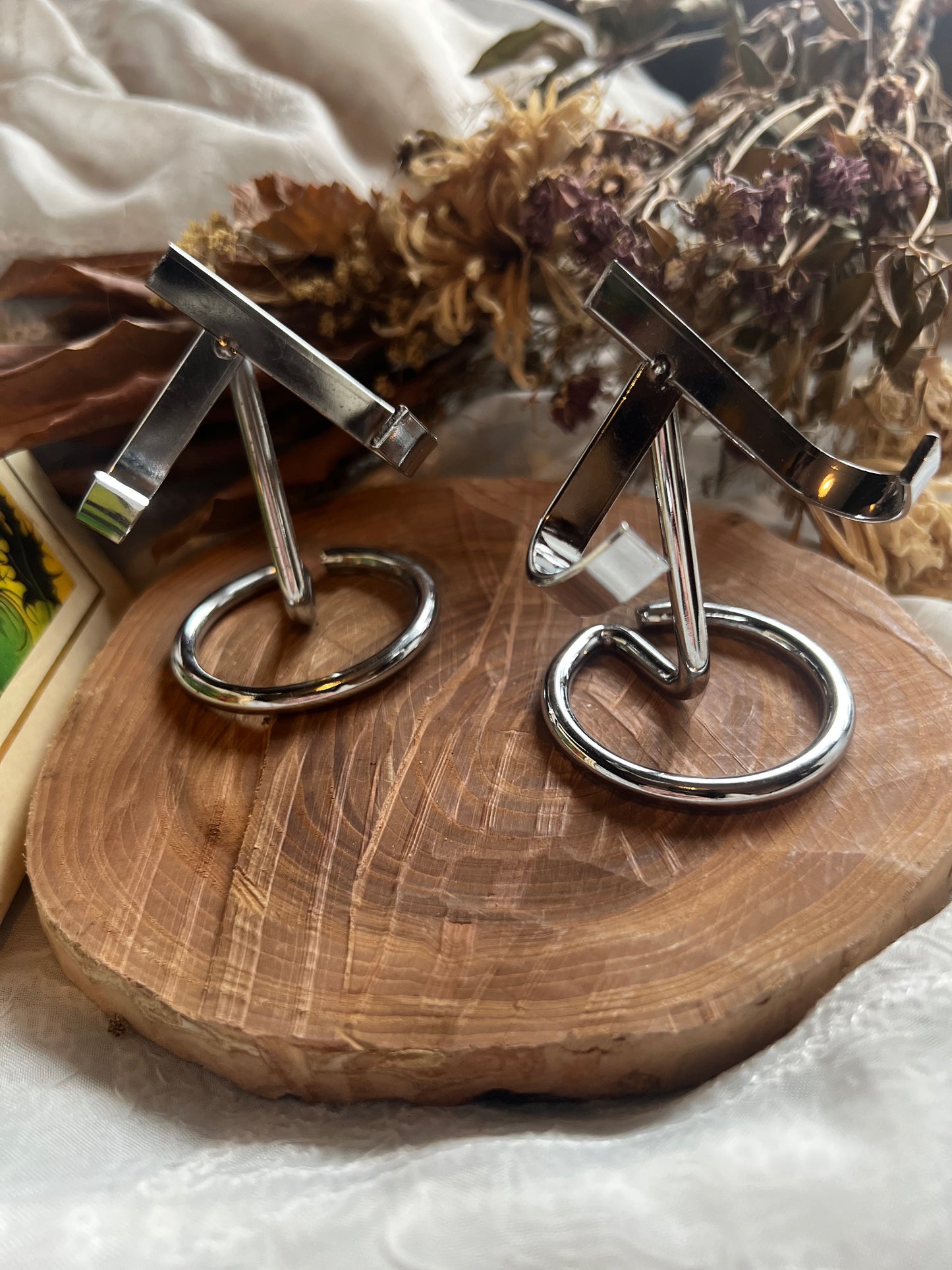silver metal crystal stand
