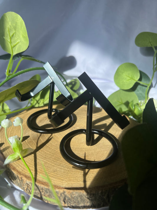 black metal crystal stand